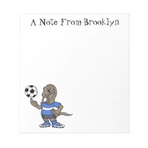 Cute funny Komodo dragon playing soccer cartoon Notepad