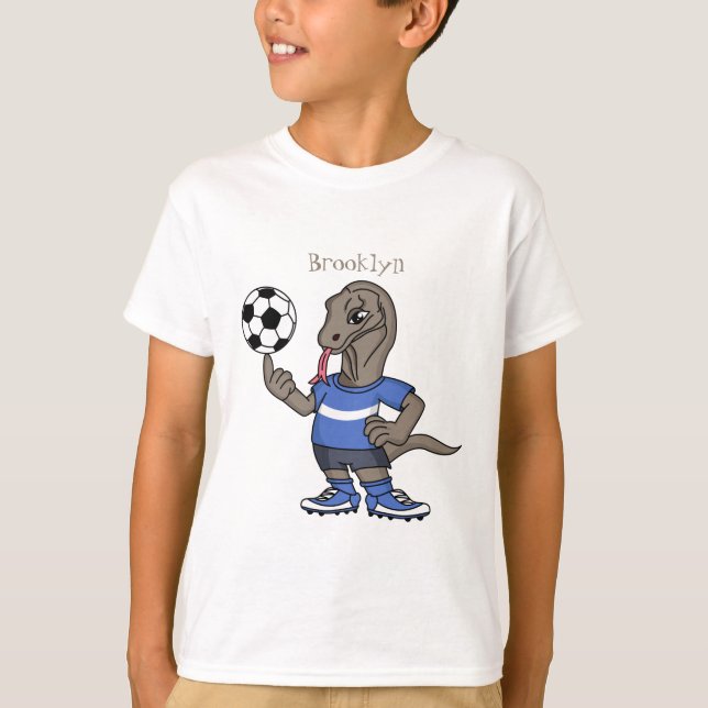 Cute funny Komodo dragon playing soccer cartoon T-Shirt (Front)