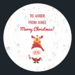 Cute Funny Modern Rudolph Santa Personalise Names Classic Round Sticker<br><div class="desc">Cute, funny, and also elegant custom-name Christmas gift sticker for kids with Santa in his red costume (holding a candy cane) and his favourite reindeer, Rudolph, behind him; with the greeting "Merry Christmas!" in cursive script / calligraphy, and two custom names. The design includes silver and off-white snowflakes and stars...</div>