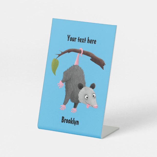 Cute funny opossum hanging from branch cartoon  pedestal sign (Front)