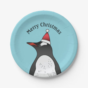 Cute Gentoo Penguin Wearing A Santa Hat On Blue Paper Plate