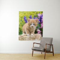 Cute Ginger Cat Kitten in a Flowery Garden Photo -