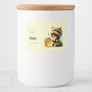 Cute Girl in Bee Costume with Honey Food Label
