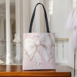 Cute Girly Ivory White Bow on Pink Tote Bag<br><div class="desc">Cute and feminine,  this tote bag design has a large watercolor ivory white bow on a soft blush pink background. The bow is angled to one side adding a touch of charm. A text template is included to personalise with your name.</div>