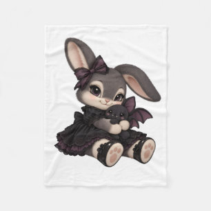 Cute Gothic Bunny Girl Cuddling a Little Bat Fleece Blanket