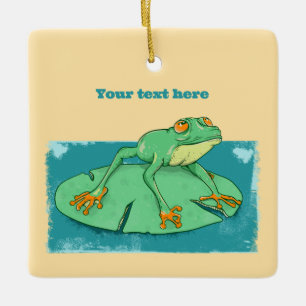 Cute green frog on a lily pad ceramic ornament