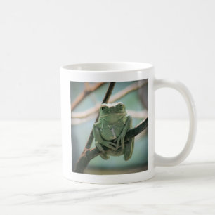 Cute Green Frog Sitting on a Branch Coffee Mug