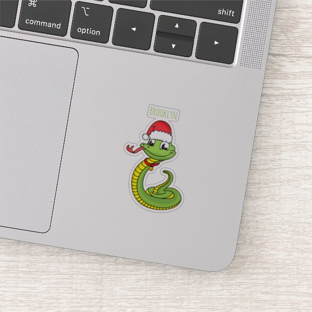 Cute green snake with santa hat cartoon  (Detail)