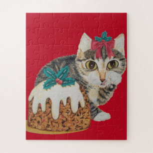cute grey tabby kitten licking paw for christmas jigsaw puzzle
