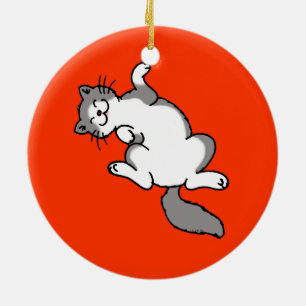 cute grey white cat lying on back ceramic tree decoration