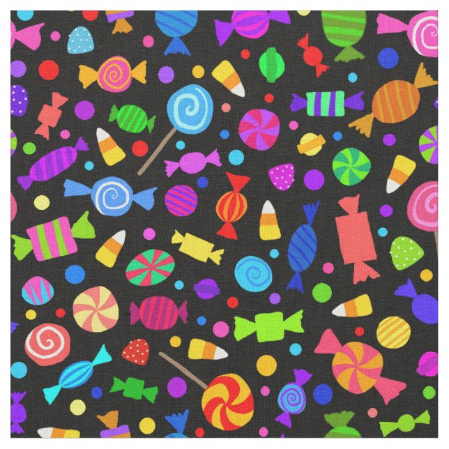 Cute Halloween candy on black pattern fabric (Close Up)