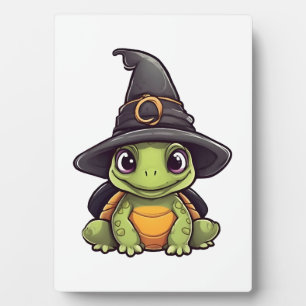 Cute Halloween turtle with a witch hat. Plaque