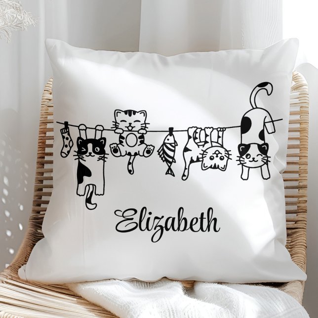 Cute Hanging Kittens Custom Name Cushion (Cute Hanging Kittens Custom Name Throw Pillow in a sunny rattan armchair.)