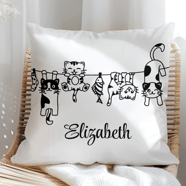 Cute Hanging Kittens Custom Name Cushion (Cute Hanging Kittens Custom Name Throw Pillow in a sunny boho neutral rattan chair.)