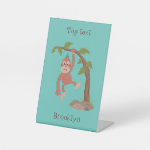Cute happy baby orangutan cartoon illustration pedestal sign