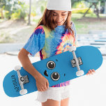Cute Happy Cartoon Face Custom Personalised Name Skateboard<br><div class="desc">Cute Happy Cartoon Face Custom Personalised Name Skateboard features your personalised name in modern typography on a simple blue background with a cute smiling cartoon face. Personalise by editing the text in the text box provided. Give a custom made gift, personalised skateboard to your favourite skateboarder for Christmas, birthday or...</div>