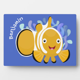 Cute happy clownfish anenome cartoon plaque