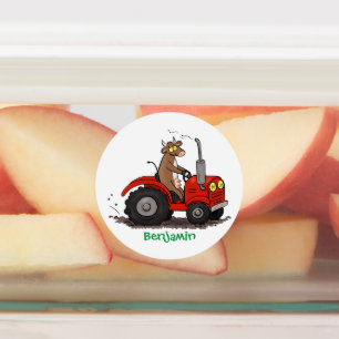 Cute happy cow driving a red tractor cartoon