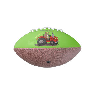 Cute happy cow driving a red tractor cartoon football