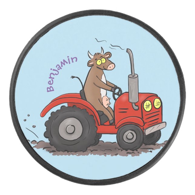 Cute happy cow driving a red tractor cartoon hockey puck (Front)