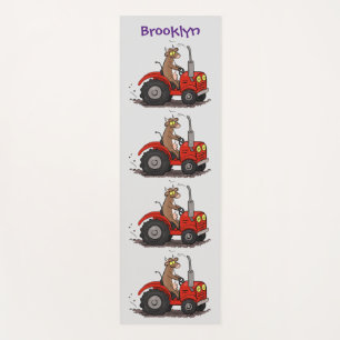 Cute happy cow driving a red tractor cartoon yoga mat