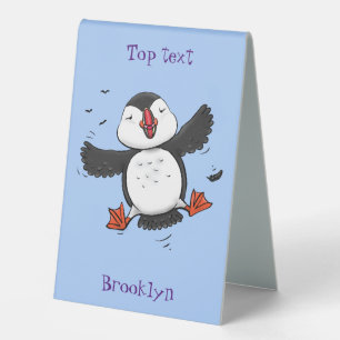 Cute happy flying puffin blue cartoon illustration