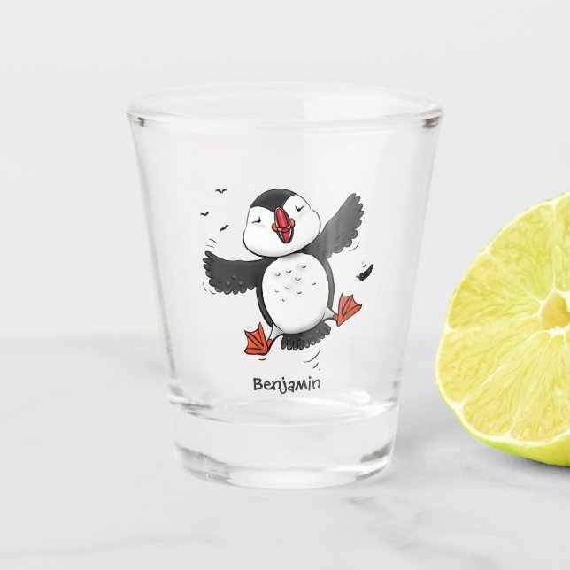 Cute happy flying puffin blue cartoon illustration shot glass (Front)