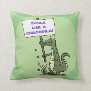 Cute, happy green crocodile with sign cartoon cushion