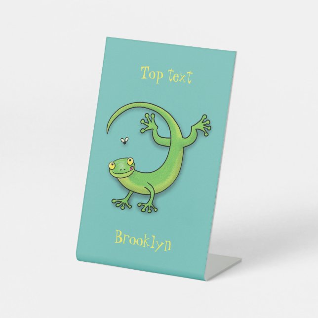 Cute happy green gecko greetings with bug cartoon pedestal sign (Front)