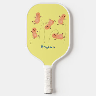 Cute happy jumping peanuts cartoon illustration pickleball paddle