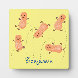 Cute happy jumping peanuts cartoon illustration plaque