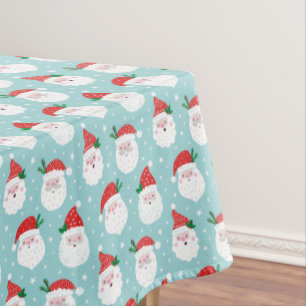 Cute Happy Santa heads on mint Tablecloth