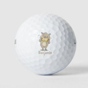 Cute happy smiling hamster with peanut cartoon golf balls
