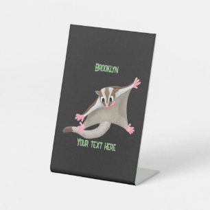 Cute happy sugar glider cartoon illustration pedestal sign
