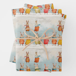 Cute hares playing in the snow wrapping paper sheet