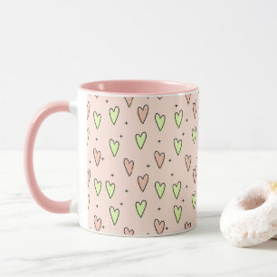 Cute hearts and stars pattern on pink mug
