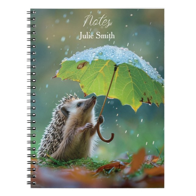 Cute hedgehog holding a leaf umbrella notebook (Front)