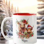 Cute Highland Cows Calf Christmas Santa Hat Two-Tone Coffee Mug<br><div class="desc">Sip in style this holiday season with our "Adorable Highland Cows in Santa Hats" personalised coffee mug. This charming mug features a delightful illustration of Highland cows donning festive Santa hats, adding a touch of whimsy to your Christmas celebrations. Customise this mug with a name or special message to create...</div>