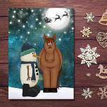 Cute Horse, Snowman, Santa and Reindeer Christmas Holiday Card<br><div class="desc">Cute Brown Horse and Snowman with Santa and his Reindeer flying across a full moon on a Snowy Christmas Eve Holiday Christmas Card. Inside Greeting - "Wishing You A Merry Christmas And A Happy New Year! May All Your Holiday Dreams And Wishes Come True.". Greeting can be personalised to read...</div>