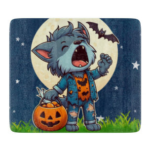 Cute howling werewolf monster with pumpkin cutting board
