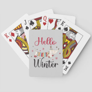 Cute ice skating dog playing cards