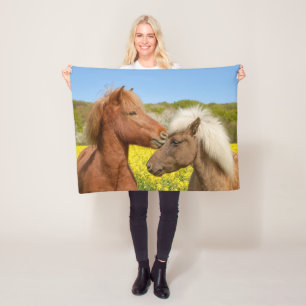 Cute Icelandic Horses Cuddle in a Spring Meadow - Fleece Blanket