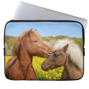 Cute Icelandic Horses Cuddle in a Spring Meadow - Laptop Sleeve