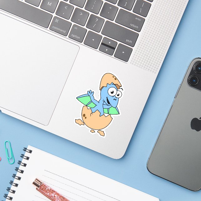 Cute Illustration Of A Baby Pterodactyl Hatching. (Laptop w/ iPhone)
