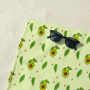 Cute kawaii avocado on green beach towel