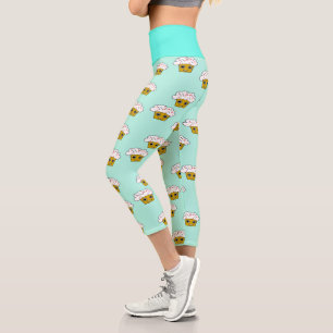 Cute kawaii cupcakes on blue capri leggings