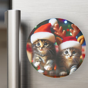 Cute kittens with Santa Claus and reindeer hats Magnet