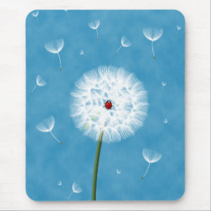 Cute ladybug sitting on top of a dandelion mouse pad