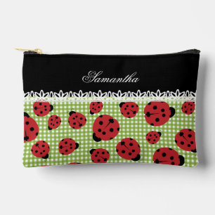 Cute ladybugs on green and custom name on black accessory pouch