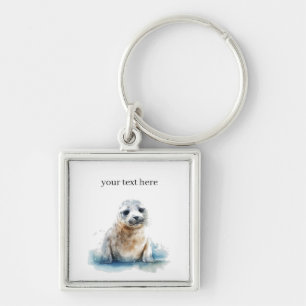 Cute little baby seal in white and blue key ring
